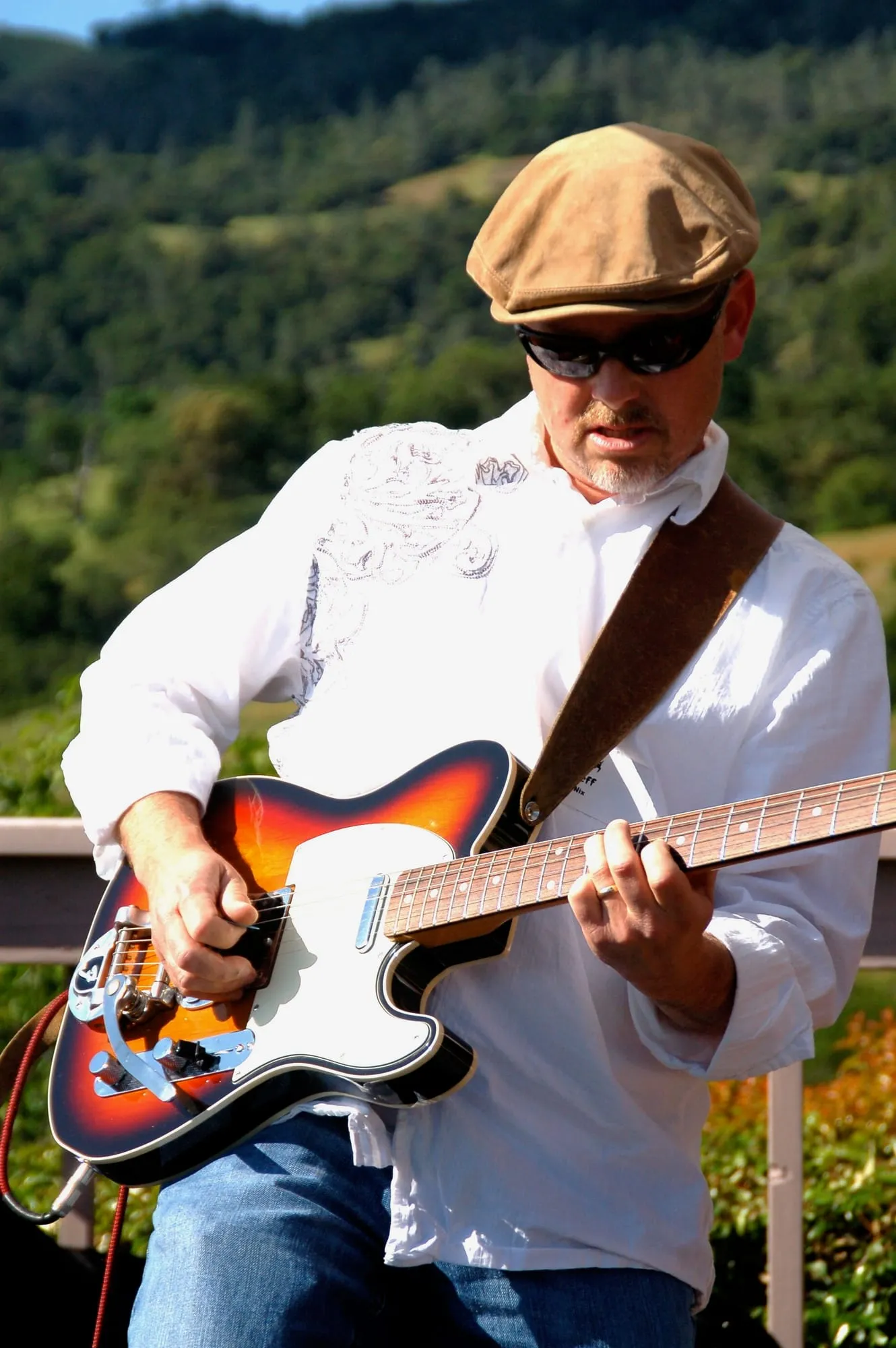 Sunburst guitar on the hillside
